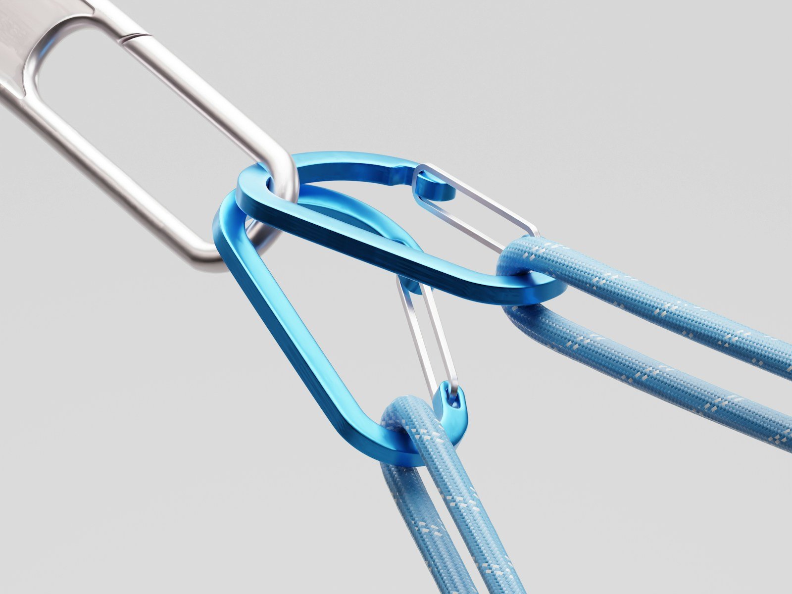 Two carabiners linked with a rope